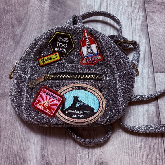 ALDO Farore Women’s Mini Silver Sparkle Backpack - Picture 1 of 3